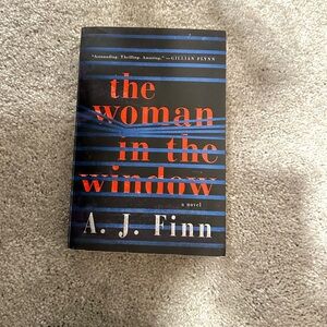 “The Woman In The Window” by A.J. Flynn Paperback Novel